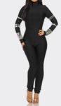 The “Attention Please” Bandge Jumpsuit